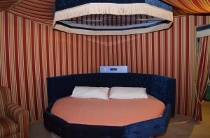 The Large 10-Sided Bed With Mirror and lights above